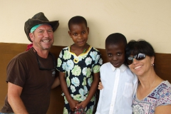 Team members Fred Kampmann and Laurie Slaughter loving on their sponsor children