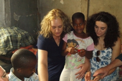 Michelle Freyre and Anne Dean visiting a sponsor child